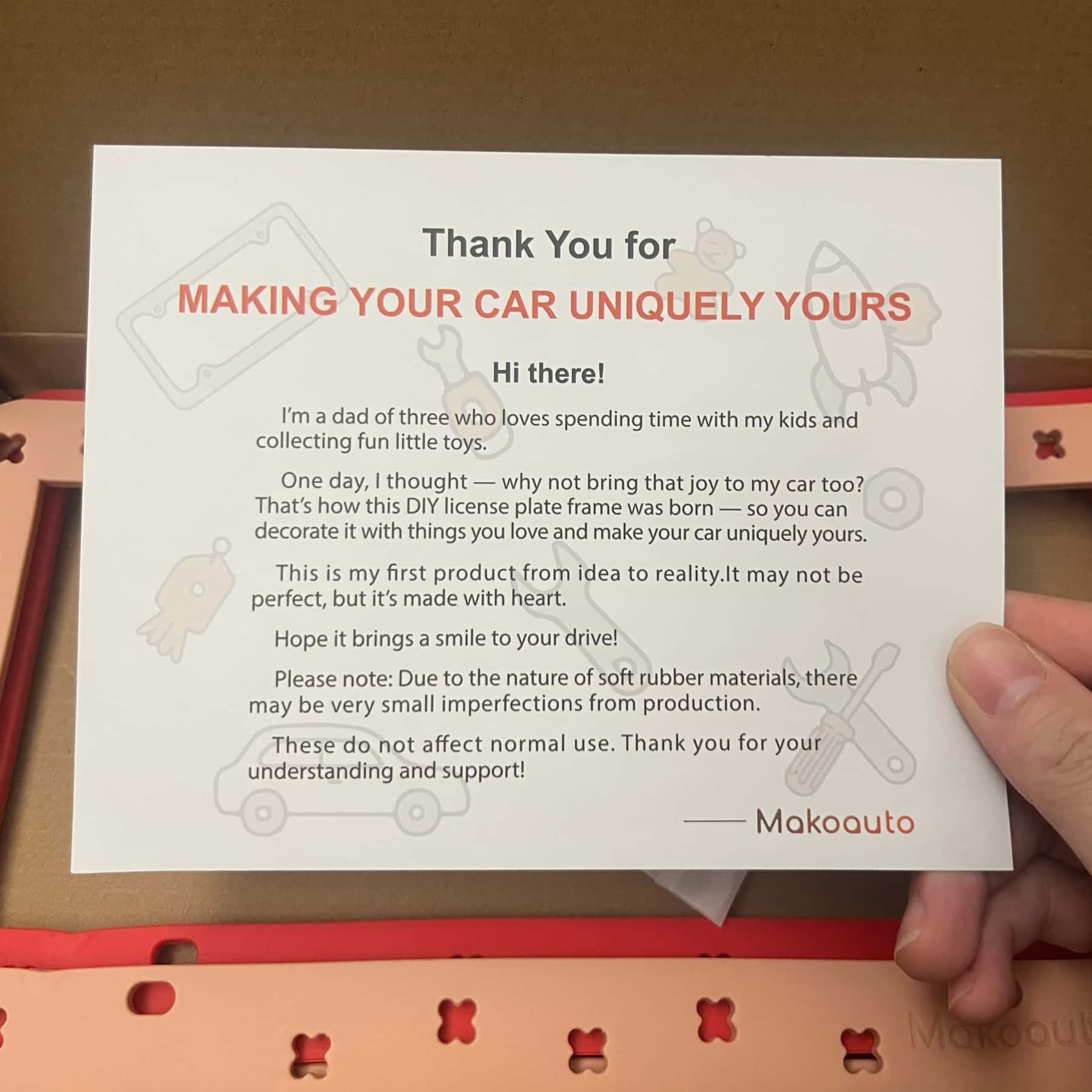 Makoauto founder thank you card with a custom DIY shoe charm license plate frame message