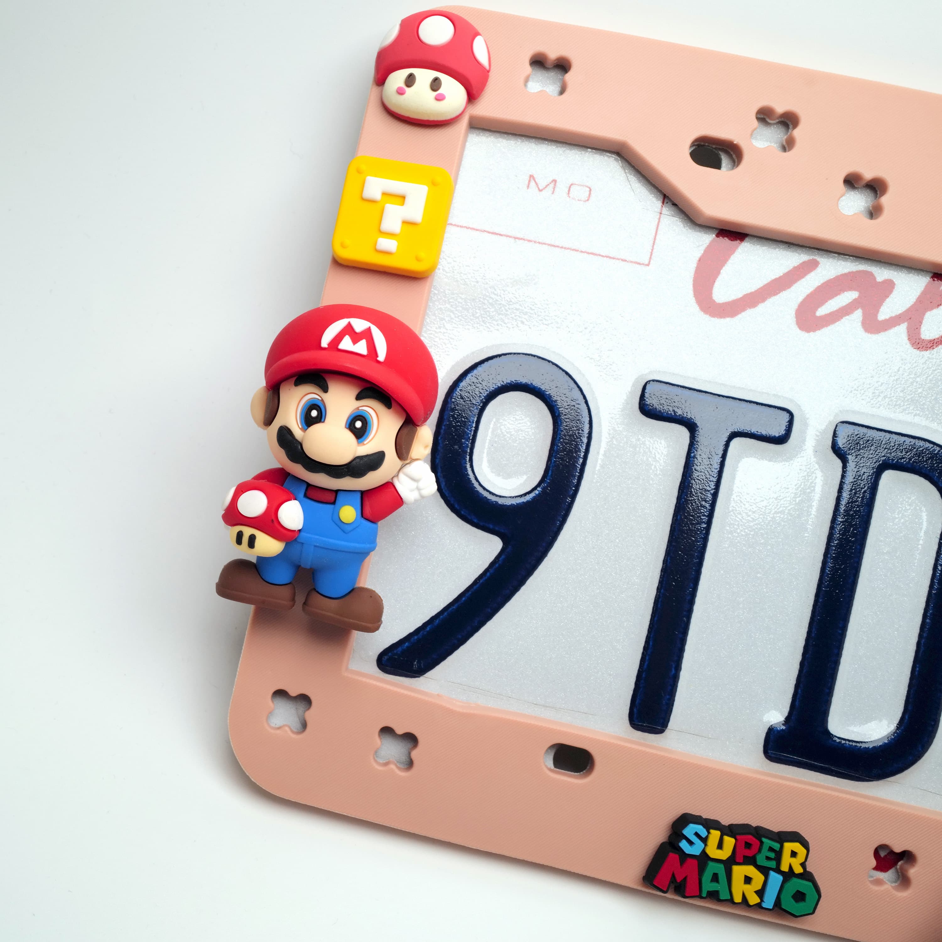 Pink gamer aesthetic car exterior decor on a white vehicle