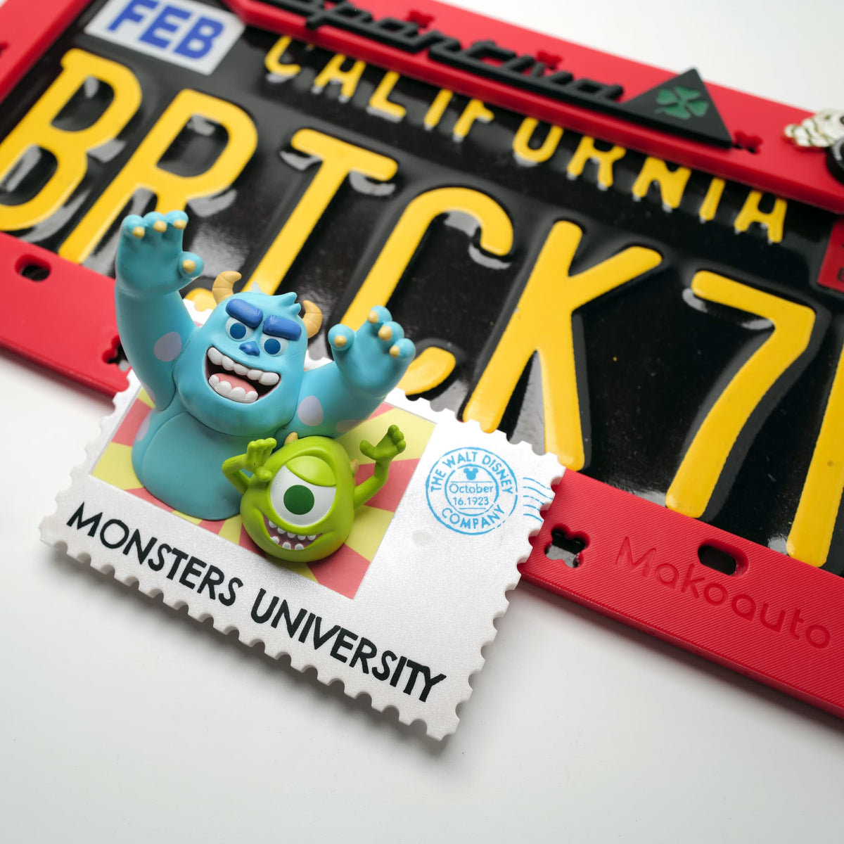 Close-up detail of the nostaligic "University Postage Stamp" style shoe charm with the classic cartoon duo and text.