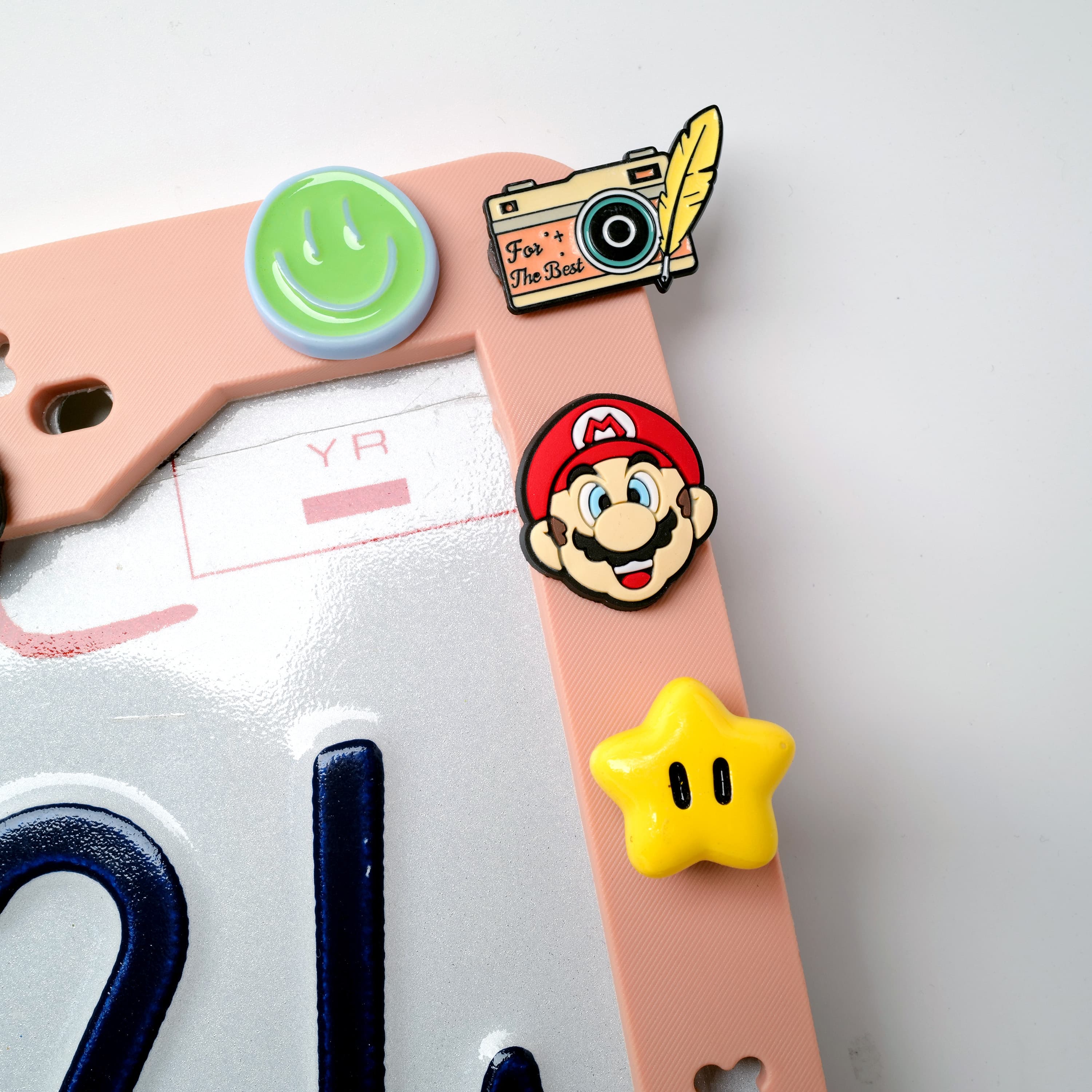 Classic arcade pixel block and coin shoe charm detail